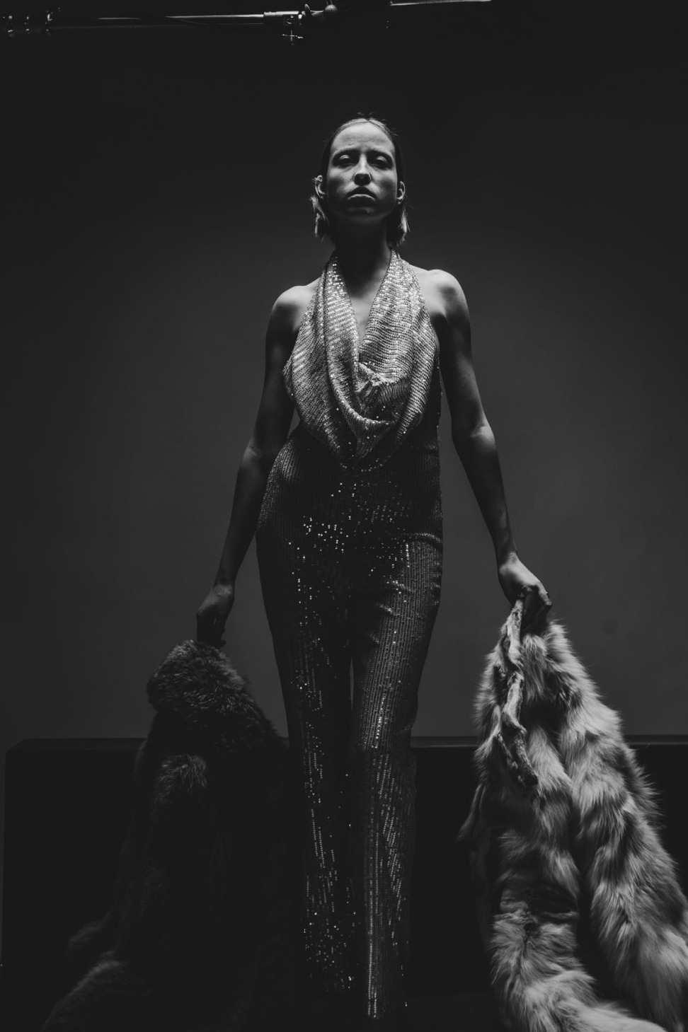 Iryna Berdnyk, black-and-white fashion standing in sequins